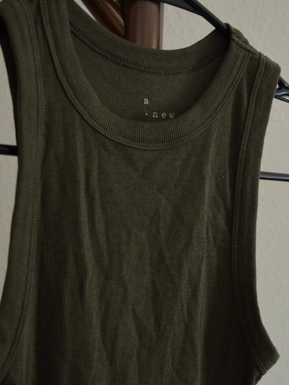 Dark green women's razor back tank